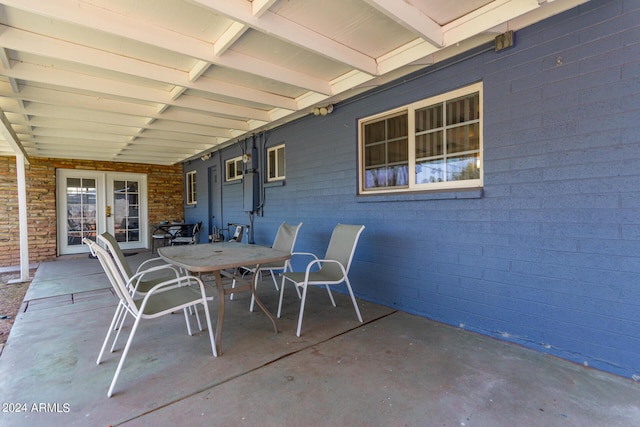 view of patio featuring outdoor dining area