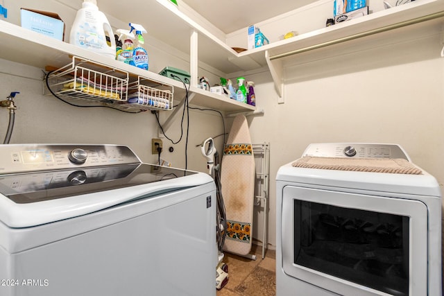 washroom with laundry area and separate washer and dryer