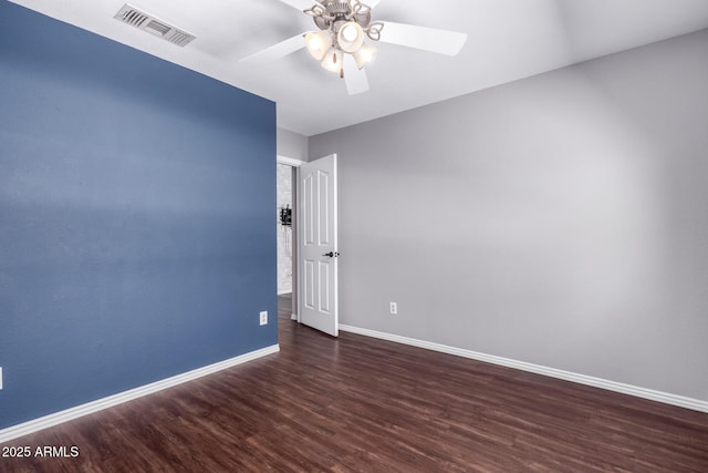8500 W Saint John Rd, Peoria, AZ 85382 - spare room featuring baseboards, ceiling fan, and wood finished floors