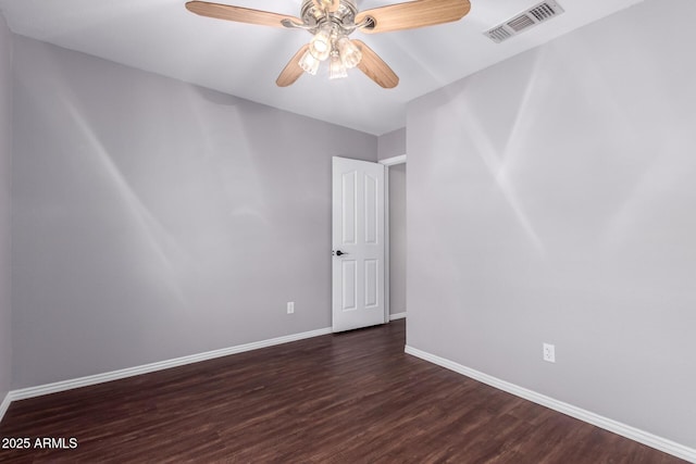 8500 W Saint John Rd, Peoria, AZ 85382 - unfurnished room with baseboards, dark wood-type flooring, and a ceiling fan
