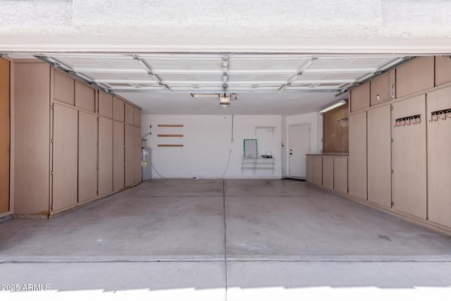 8500 W Saint John Rd, Peoria, AZ 85382 - garage featuring electric water heater and a garage door opener