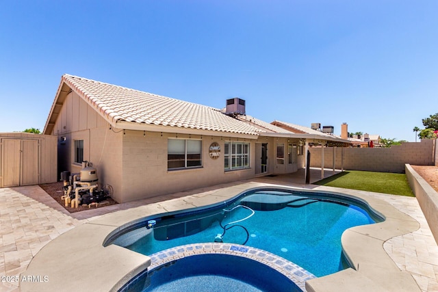 8500 W Saint John Rd, Peoria, AZ 85382 - view of swimming pool featuring a pool with connected hot tub, a fenced backyard, and a patio area