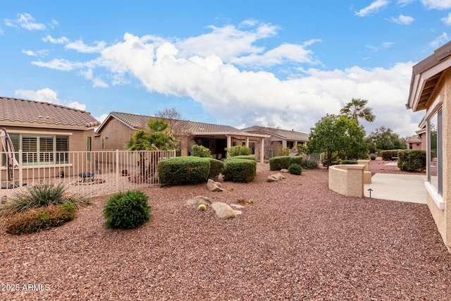 view of yard with a patio area and fence