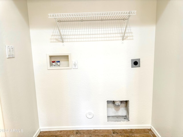 washroom featuring electric dryer hookup, gas dryer hookup, and washer hookup