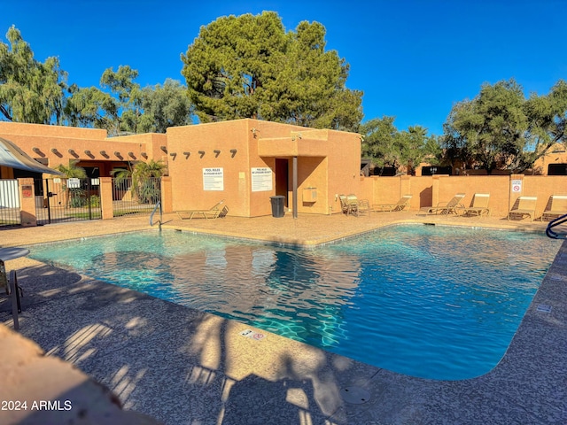 view of pool featuring a patio