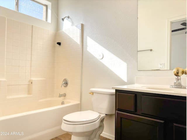 full bathroom featuring shower / washtub combination, vanity, and toilet