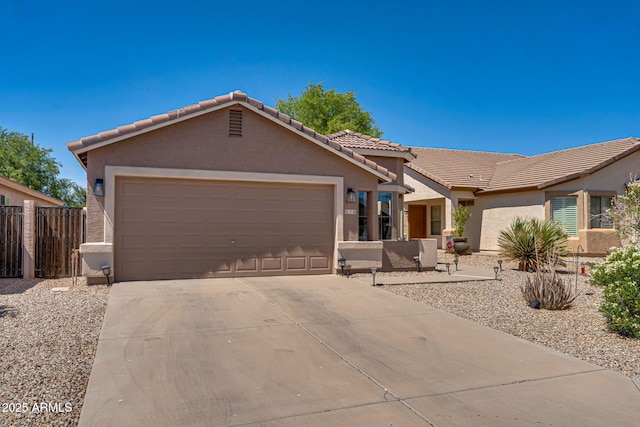 2738 E Silversmith Trl, San Tan Valley, AZ 85143 - view of front facade featuring stucco siding, a tile roof, a garage, and driveway