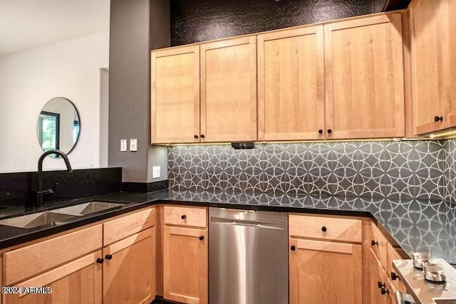 kitchen with decorative backsplash, light brown cabinets, sink, and stainless steel dishwasher