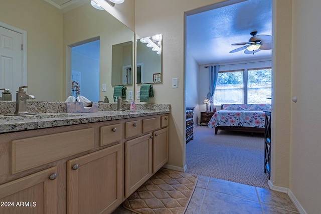 bathroom with vanity, tile patterned floors, and ceiling fan