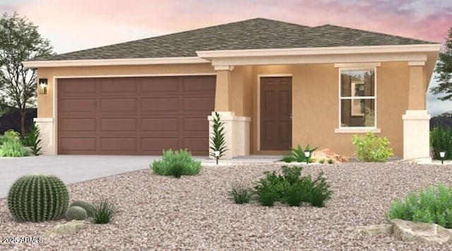 ranch-style home featuring a garage, roof with shingles, concrete driveway, and stucco siding