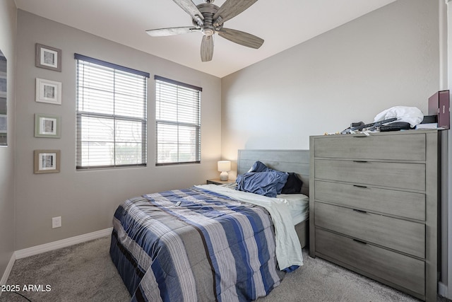 bedroom with light carpet, lofted ceiling, and ceiling fan