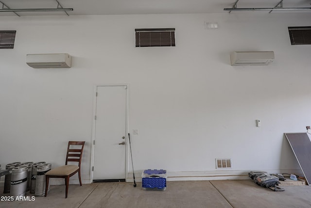 interior space featuring a wall mounted air conditioner