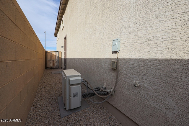 view of home's exterior with ac unit