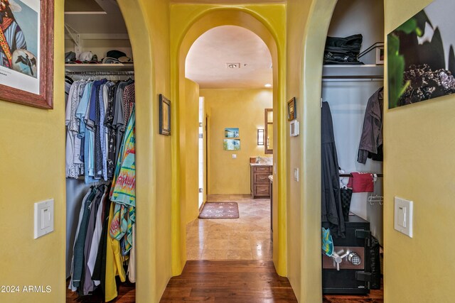 hall featuring tile patterned flooring