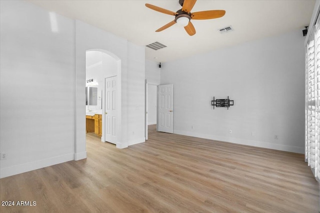 interior space with light hardwood / wood-style floors and ceiling fan