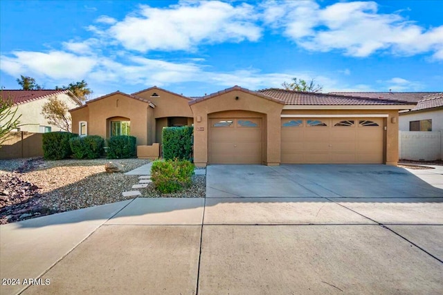 view of front of house with a garage