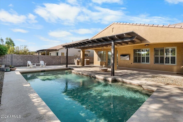 view of swimming pool with a patio