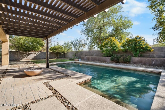 view of swimming pool with a pergola and a patio