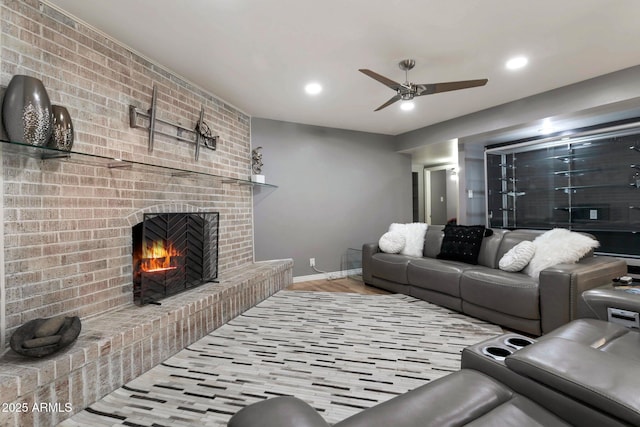 4304 W Calle Poco, Laveen, AZ 85339 - living room with a fireplace, a ceiling fan, baseboards, and recessed lighting