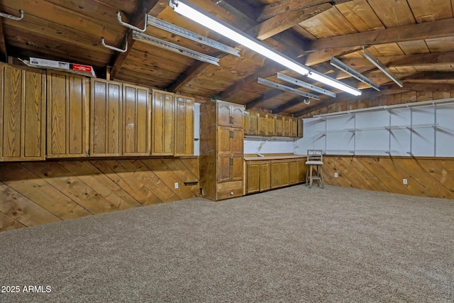 4304 W Calle Poco, Laveen, AZ 85339 - miscellaneous room featuring vaulted ceiling, wooden walls, and carpet floors