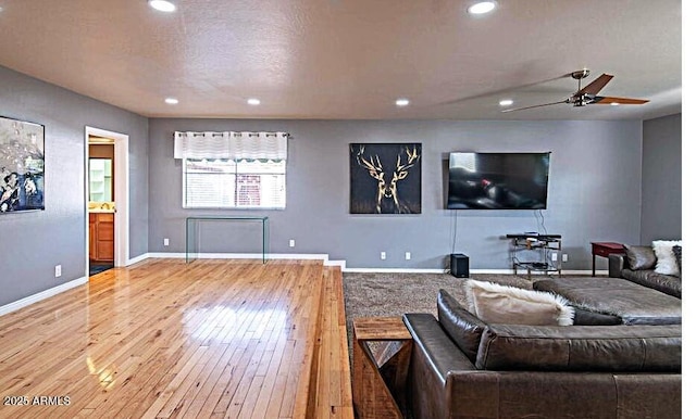 4304 W Calle Poco, Laveen, AZ 85339 - living room featuring recessed lighting, hardwood / wood-style flooring, baseboards, and a ceiling fan