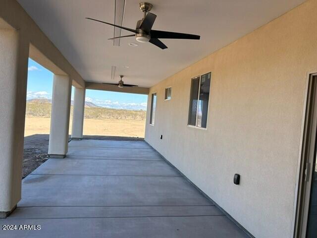 view of patio with ceiling fan