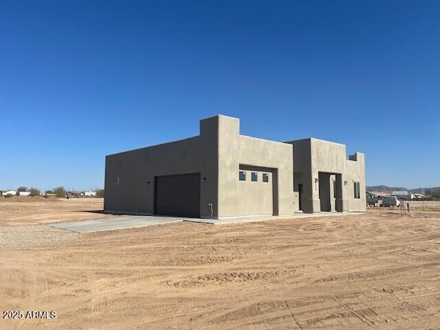 view of home's exterior featuring a garage