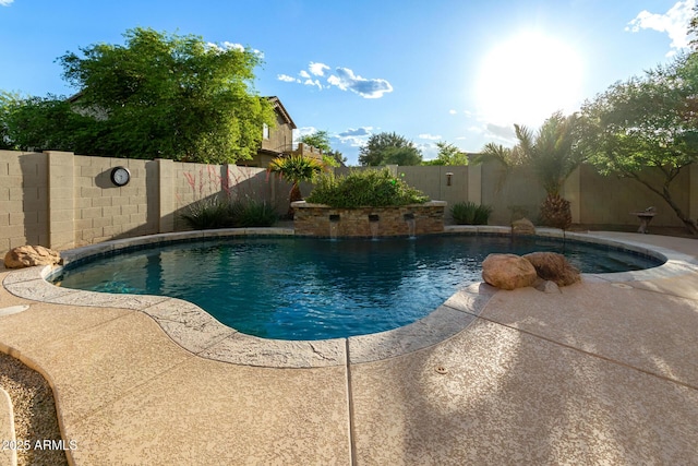 view of pool with a fenced in pool, a fenced backyard, and a patio area