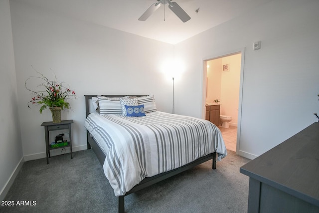 bedroom featuring ensuite bath, ceiling fan, and carpet