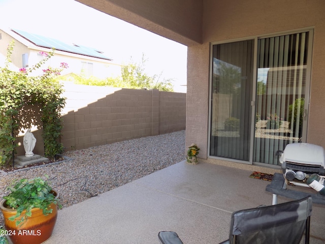 view of patio with fence