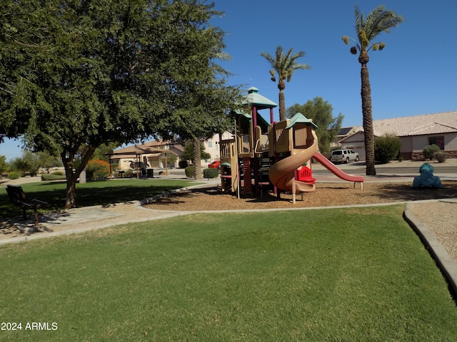 community playground featuring a yard