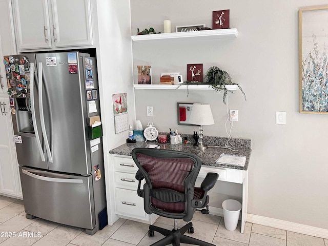 tiled office featuring built in desk