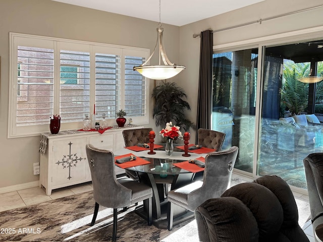 dining area with light tile patterned flooring