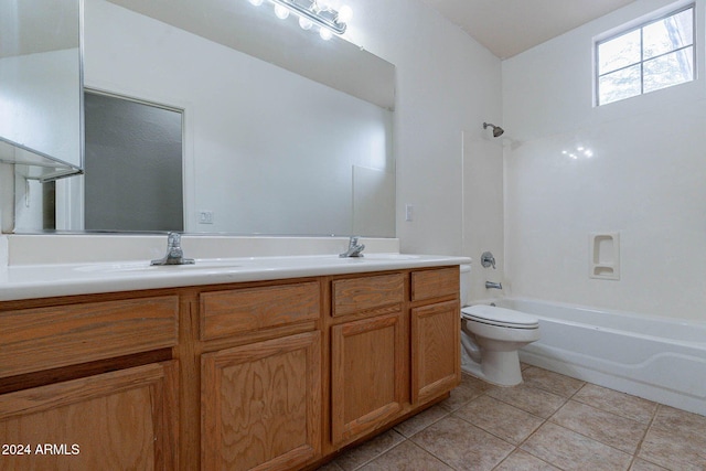 bathroom with tile patterned flooring, double vanity, toilet, shower / washtub combination, and a sink
