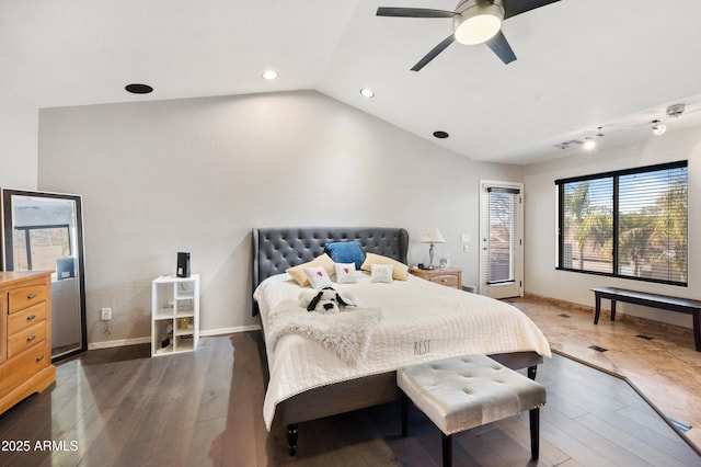 bedroom with dark wood-type flooring, ceiling fan, and vaulted ceiling