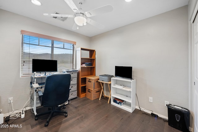 office with dark hardwood / wood-style floors and ceiling fan