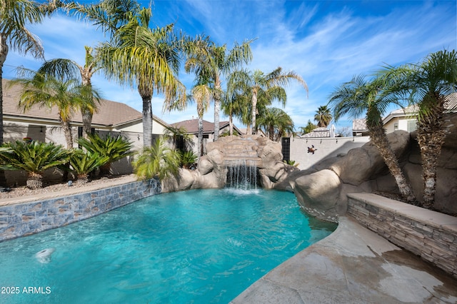 view of pool with pool water feature