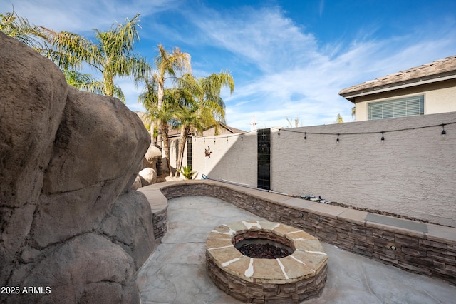 exterior details featuring a fire pit