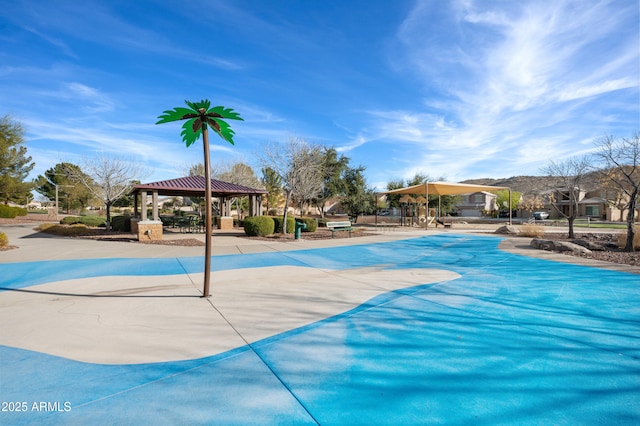 view of swimming pool with a gazebo