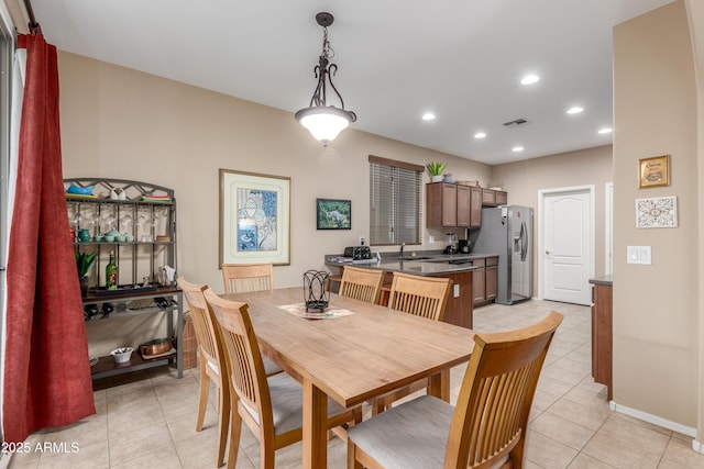 dining space with recessed lighting, visible vents, baseboards, and light tile patterned floors