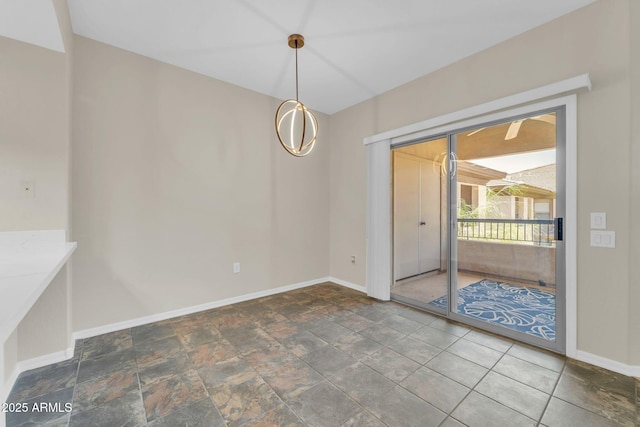 20121 N 76th St Unit 2021, Scottsdale, AZ 85255 - empty room with baseboards and stone finish floors