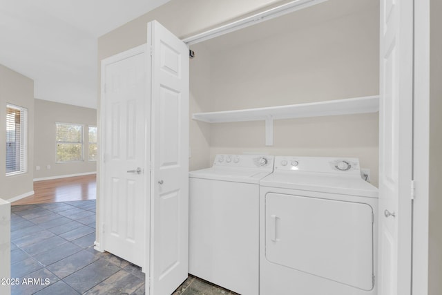 20121 N 76th St Unit 2021, Scottsdale, AZ 85255 - laundry room with independent washer and dryer and baseboards