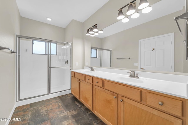 20121 N 76th St Unit 2021, Scottsdale, AZ 85255 - full bath featuring a shower stall, double vanity, and stone finish flooring