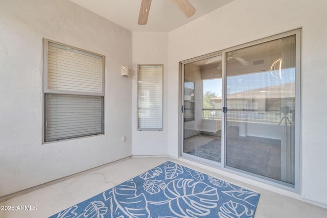 20121 N 76th St Unit 2021, Scottsdale, AZ 85255 - entrance to property with stucco siding and a ceiling fan