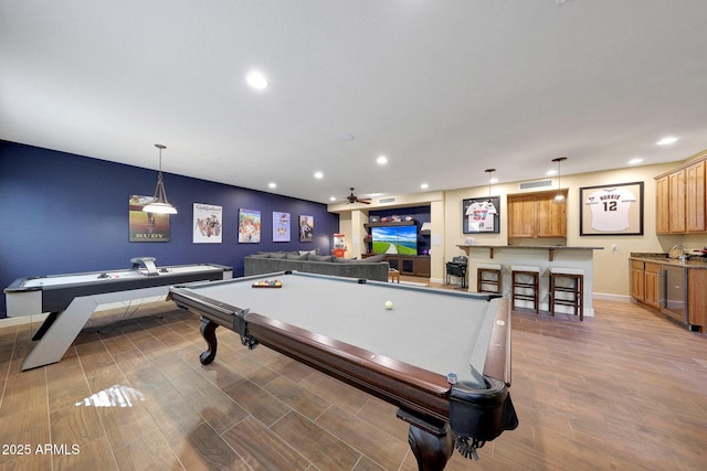 rec room featuring recessed lighting, ceiling fan, wood finished floors, billiards, and baseboards