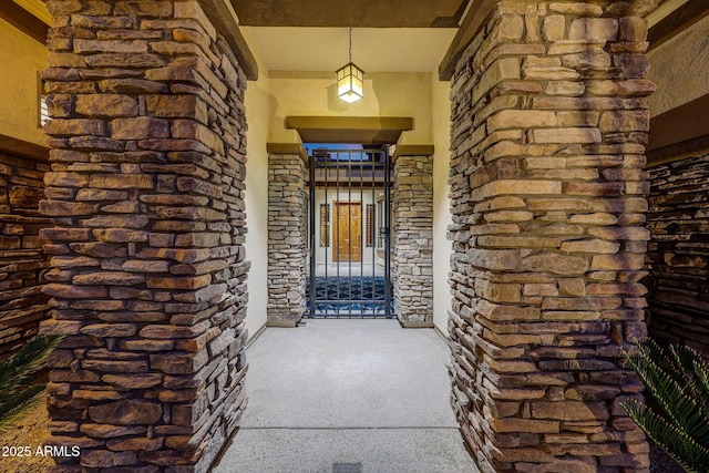 entrance to property with stone siding