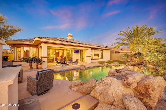 pool featuring a patio