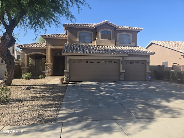 955 W Laurel Ave, Gilbert, AZ 85233 - mediterranean / spanish house with stone siding, a tiled roof, and stucco siding