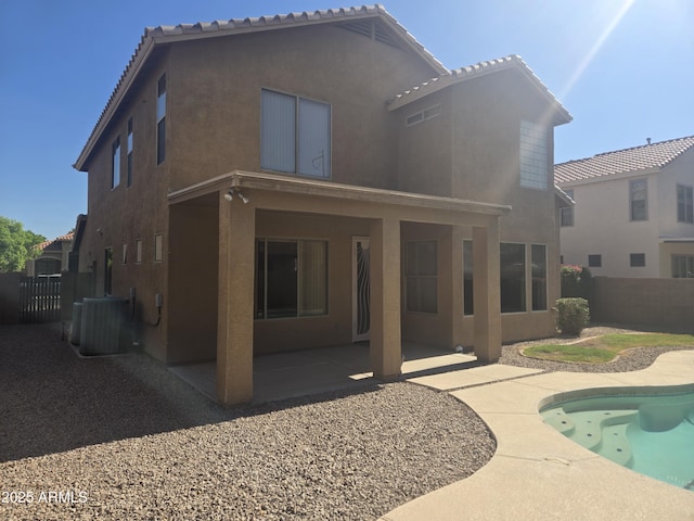 955 W Laurel Ave, Gilbert, AZ 85233 - back of house featuring stucco siding, a patio area, and a tiled roof