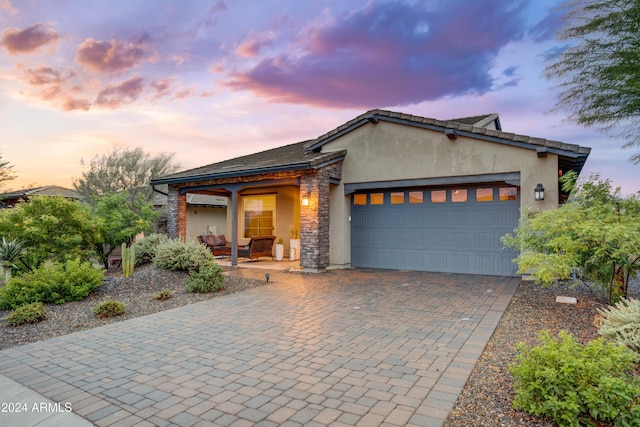 view of front of property featuring a garage